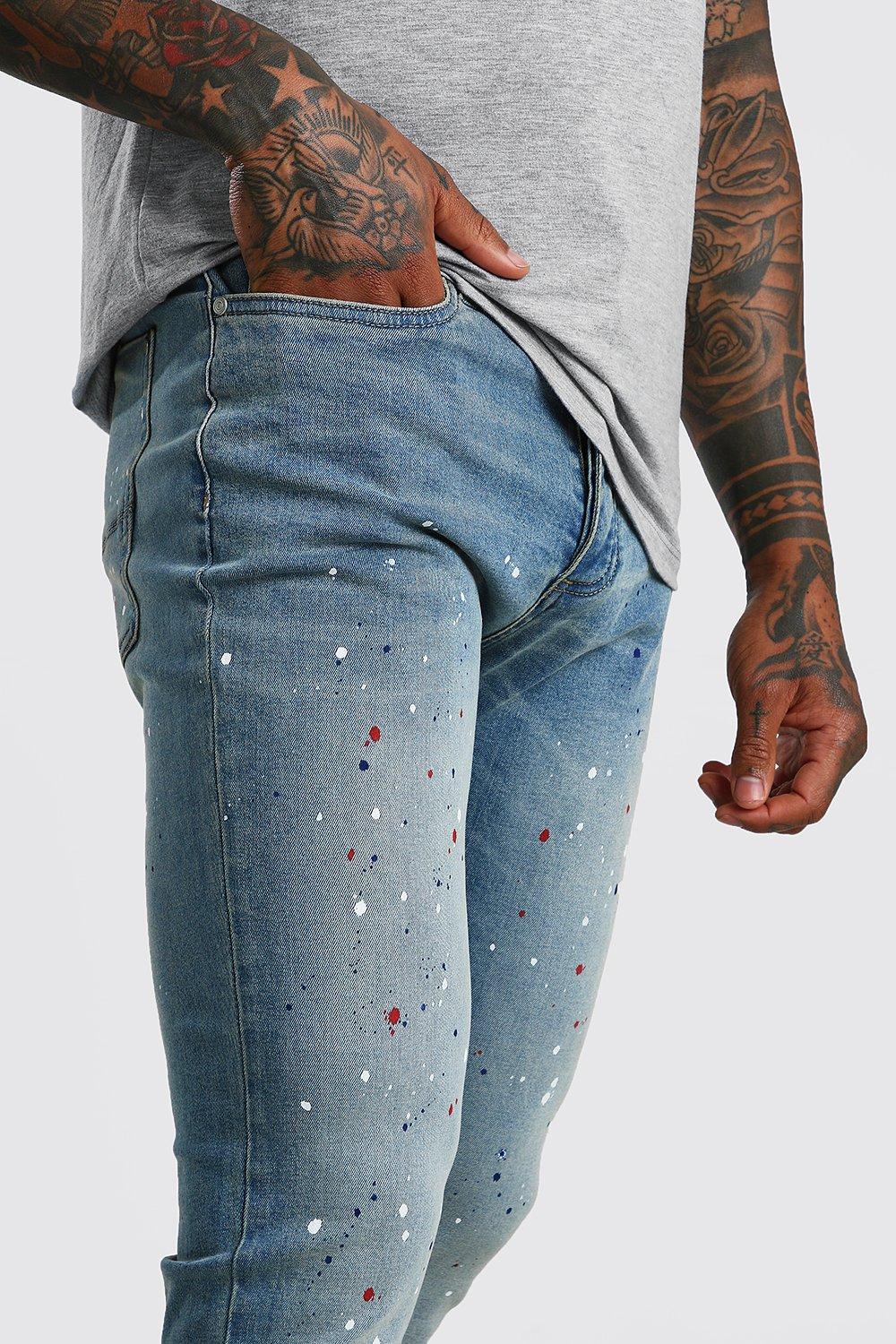 Jeans con schizzi hot sale di vernice uomo